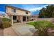 A generous backyard featuring a covered patio, perfect for relaxation or entertaining at 775 Wigan Pier Dr, Henderson, NV 89002