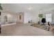 Wide angle view of large bonus room showing adjacent hallway and office area at 775 Wigan Pier Dr, Henderson, NV 89002