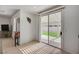 Bright eat-in kitchen with a sliding glass door out to the patio and backyard at 775 Wigan Pier Dr, Henderson, NV 89002