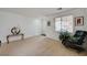 Bright and airy living room featuring neutral paint, carpet flooring, and ample natural light at 775 Wigan Pier Dr, Henderson, NV 89002