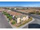 Located on a corner lot, this home boasts nice landscaping, a two-car garage, and desert views at 7853 Bethel Heights Ln, Las Vegas, NV 89113