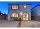 The home has a cozy backyard with a gravel landscape and a simple patio set for outdoor enjoyment at 7853 Bethel Heights Ln, Las Vegas, NV 89113