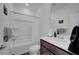 Bathroom featuring a shower-tub combination, large vanity, and neutral decor at 7853 Bethel Heights Ln, Las Vegas, NV 89113