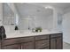Bathroom showcasing a double vanity with two sinks and a large mirror at 7853 Bethel Heights Ln, Las Vegas, NV 89113