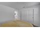 This bedroom includes neutral walls and carpet with double door closet at 7853 Bethel Heights Ln, Las Vegas, NV 89113