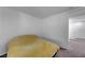 This bedroom has neutral colored walls and carpet with an entrance to another room at 7853 Bethel Heights Ln, Las Vegas, NV 89113