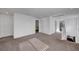 Open loft area featuring neutral carpet and light walls at 7853 Bethel Heights Ln, Las Vegas, NV 89113