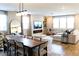 Spacious living room and dining area with lots of light and an electric fireplace at 8186 Guadiano Ave, Las Vegas, NV 89113