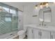 Stylish bathroom featuring quartz countertops, modern fixtures, and a glass-enclosed shower at 8416 Kawala Dr, Las Vegas, NV 89128
