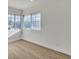 Bright, airy bedroom with hardwood floors and a large window for ample natural light at 8416 Kawala Dr, Las Vegas, NV 89128