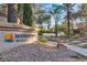 Moonlight Bay II sign in a Desert Shores community with beautiful landscaping and street view at 8416 Kawala Dr, Las Vegas, NV 89128