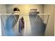 A closet with a wire shelf features personal items, offering functional storage space at 9136 Eagle Ford St, Las Vegas, NV 89113