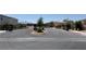 Gated community entrance provides security and welcomes residents with lush landscaping at 9136 Eagle Ford St, Las Vegas, NV 89113
