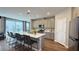 Sleek modern kitchen with quartz island, stainless steel appliances, and ample cabinet storage; perfect for entertaining at 9136 Eagle Ford St, Las Vegas, NV 89113