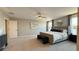 Large primary bedroom featuring neutral decor and a comfortable king-sized bed at 9136 Eagle Ford St, Las Vegas, NV 89113