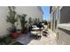 Cozy backyard patio with modern outdoor furniture and lush landscaping, ideal for relaxing at 9136 Eagle Ford St, Las Vegas, NV 89113