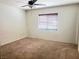 Neutral bedroom featuring carpet and window at 9299 Adamshurst Ave, Las Vegas, NV 89148