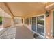 Covered patio area with textured ceiling and natural light, ideal for outdoor relaxation and entertaining at 9717 Buckhorn Dr, Las Vegas, NV 89134