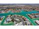 Exclusive waterfront homes showcasing stunning architecture, private docks, lush landscaping, and pristine waterways at 2821 Whispering Wind Dr, Las Vegas, NV 89117