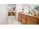 Bright kitchen featuring stainless steel appliances and breakfast nook at 2821 Whispering Wind Dr, Las Vegas, NV 89117
