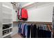 Organized walk-in closet featuring shelving, hanging racks and ample storage for a tidy and functional space at 2821 Whispering Wind Dr, Las Vegas, NV 89117