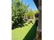 Private backyard retreat features a tiered fountain, stone table, and lush greenery at , Las Vegas, NV 89141