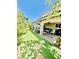 Backyard patio with a covered seating area and artificial grass at , Las Vegas, NV 89141