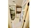 Bathroom with a glass-enclosed shower and white tile floors at , Las Vegas, NV 89141