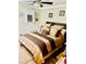 Bedroom featuring a large bed, neutral decor, and a ceiling fan at , Las Vegas, NV 89141