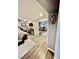 Spacious main bedroom with hardwood style flooring, sitting area, and multiple doorways at , Las Vegas, NV 89141