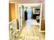 Second-floor view into the main bedroom, featuring laminate floors, neutral decor, and a calming atmosphere at , Las Vegas, NV 89141