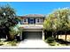 Charming two-story home with a tile roof, a spacious garage, and a well-maintained landscaped front yard at , Las Vegas, NV 89141
