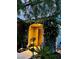 Charming front porch with climbing floral vines, ornate security door, and welcoming decor creating curb appeal at , Las Vegas, NV 89141