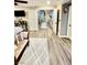 Spacious main bedroom with hardwood style flooring, sitting area, and multiple doorways at , Las Vegas, NV 89141