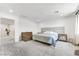 Spacious bedroom with carpet, recessed lighting, and gray padded headboard at 1000 Cetona Ct, Henderson, NV 89011