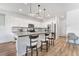 Modern kitchen with a center island, pendant lighting, and stainless steel appliances at 1000 Cetona Ct, Henderson, NV 89011