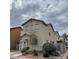 Charming two-story home featuring stucco exterior and tile roof; inviting curb appeal at 10331 Ednor St, Las Vegas, NV 89183