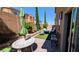 This backyard is a beautiful outdoor living area with seating, landscaping, and a cozy patio at 10668 Berkshire Woods Ave, Las Vegas, NV 89166