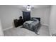 Bedroom features a ceiling fan, a modern-style bed, curtains and neutral paint at 10668 Berkshire Woods Ave, Las Vegas, NV 89166