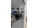 Walk-in closet provides ample storage and well-organized shelving with modern flooring at 10668 Berkshire Woods Ave, Las Vegas, NV 89166