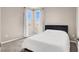 Bedroom with neutral walls, carpet, and lots of natural light at 11658 Midnight Melody Ave, Las Vegas, NV 89138