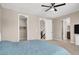 Relaxing main bedroom with walk-in closet and ensuite bathroom entrances, offering ample space at 11658 Midnight Melody Ave, Las Vegas, NV 89138