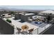 Enjoy outdoor living on this roof deck with multiple seating areas and amazing views at 11658 Midnight Melody Ave, Las Vegas, NV 89138