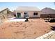 Spacious backyard featuring a hammock and outdoor grill at 1709 High Breeze Ct, Las Vegas, NV 89106