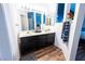 Bathroom view features double sinks and black cabinets at 1709 High Breeze Ct, Las Vegas, NV 89106