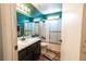 Bathroom showcasing shower and tub combination at 1709 High Breeze Ct, Las Vegas, NV 89106