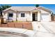Charming single story home featuring a tile roof, two car garage and well manicured landscaping at 1709 High Breeze Ct, Las Vegas, NV 89106