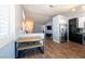 Eat-in kitchen featuring stainless appliances, granite countertops and white cabinetry at 1709 High Breeze Ct, Las Vegas, NV 89106