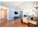 Open living room with hard surface flooring and an open concept to the kitchen at 1709 High Breeze Ct, Las Vegas, NV 89106