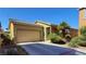 Charming single-story home with desert landscaping and a two-car garage at 2613 Calico Hearts Ct, Las Vegas, NV 89106
